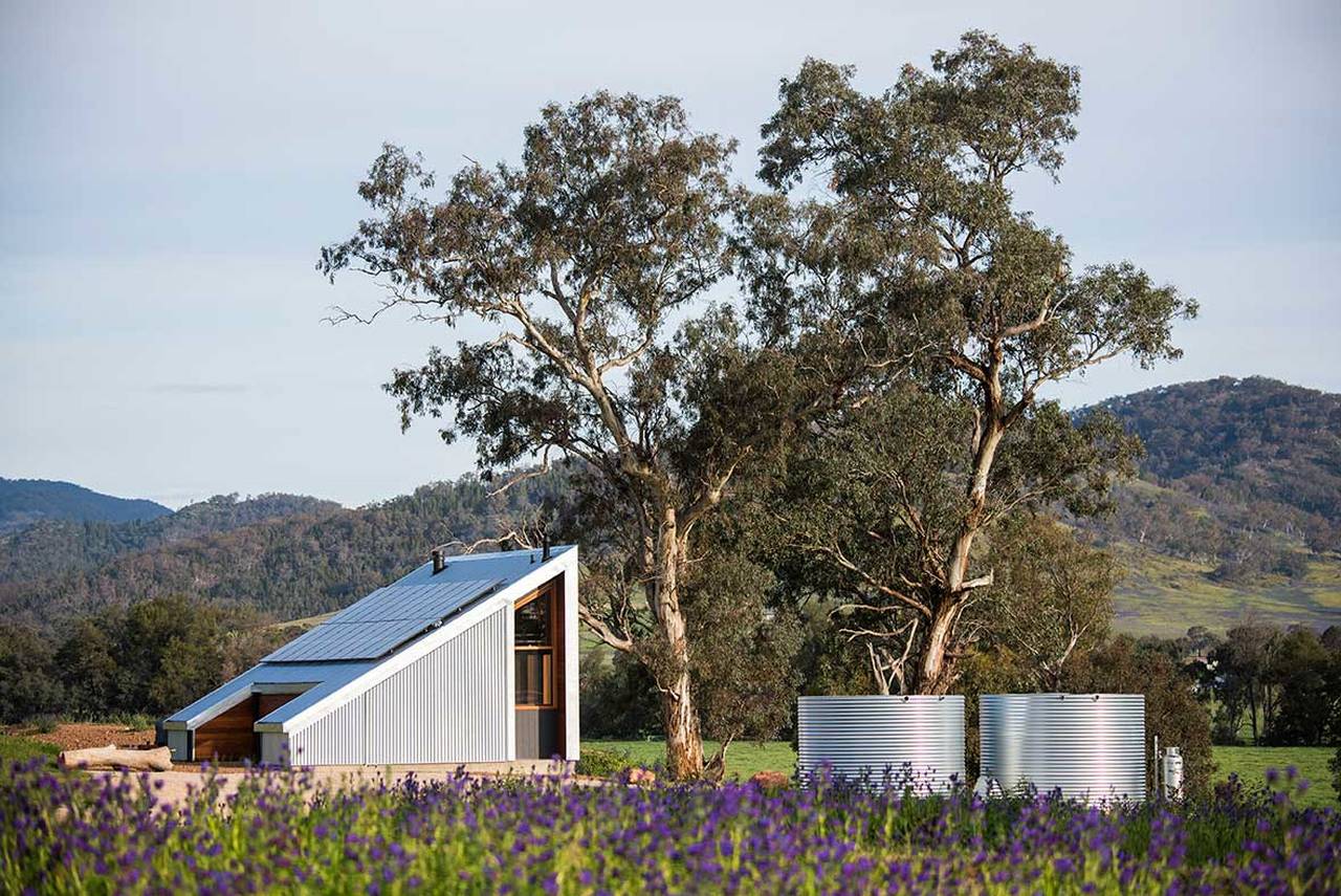 Exterior view of the cabin and its off-grid facilities