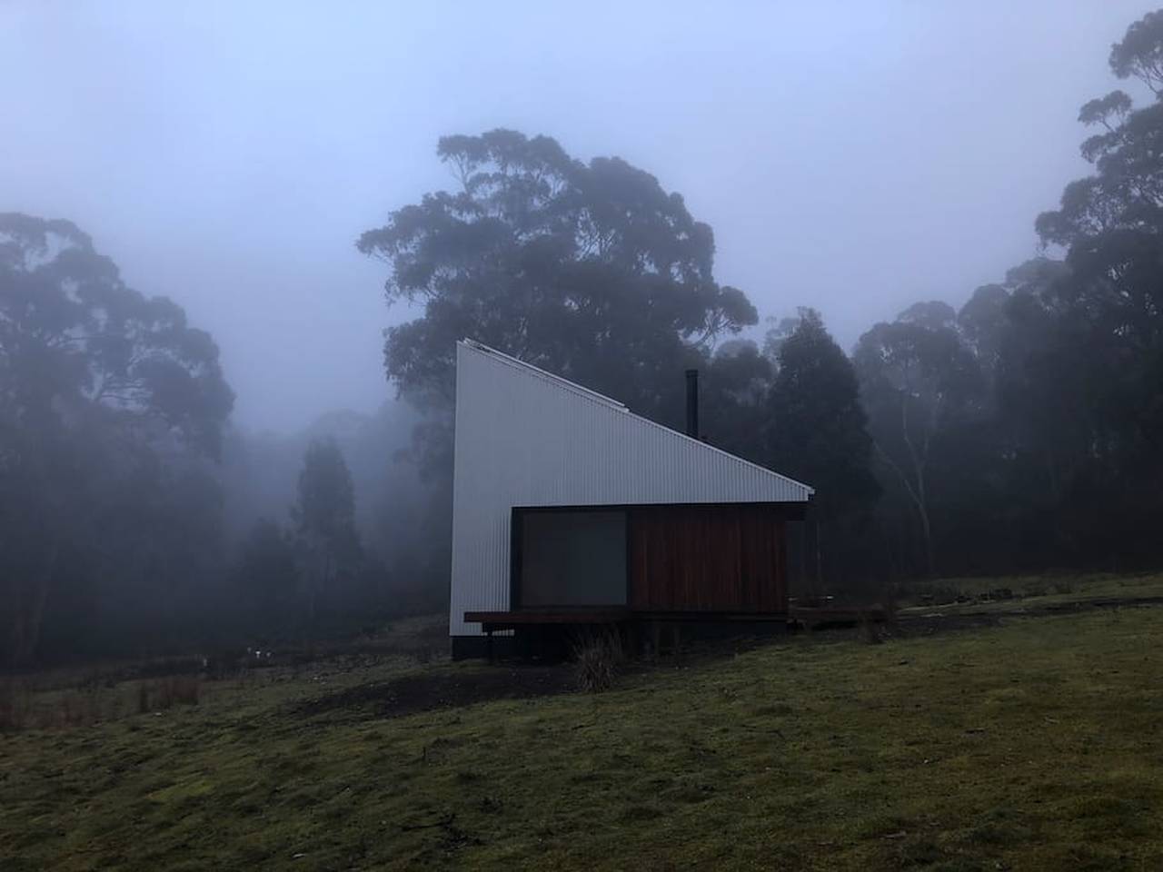 The cabin on a foggy night