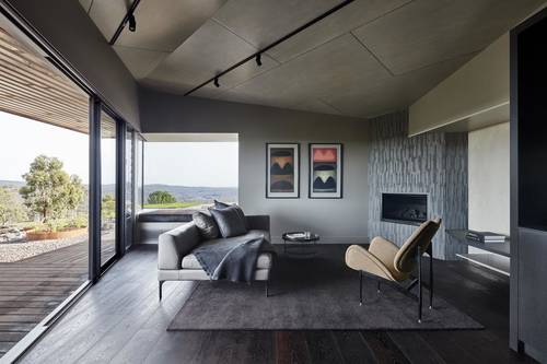 The lounge room with views out over the country side