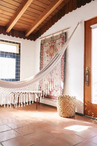 Relax for a sunny afternoon in this fringed hammock.