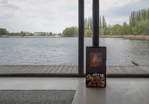 The houseboat has its very own little fireplace