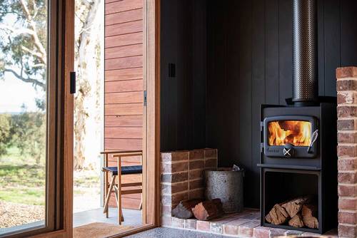The wood burning fireplace to keep you warm in winter