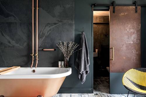 Bathroom with brass tub