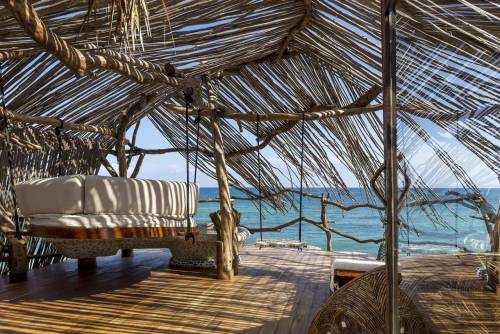 Covered lounge area over looking the ocean